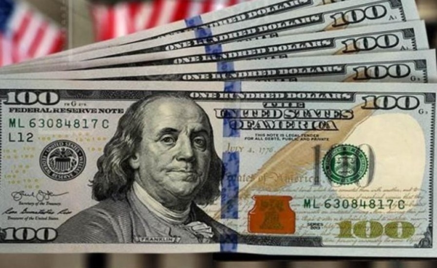 الدولار يتذبذب قبيل قرار الاحتياطي الفيدرالي وترقب اتفاقيات التجارة العالمية