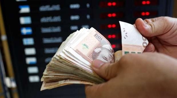 الدرهم يرتفع مقابل الدولار