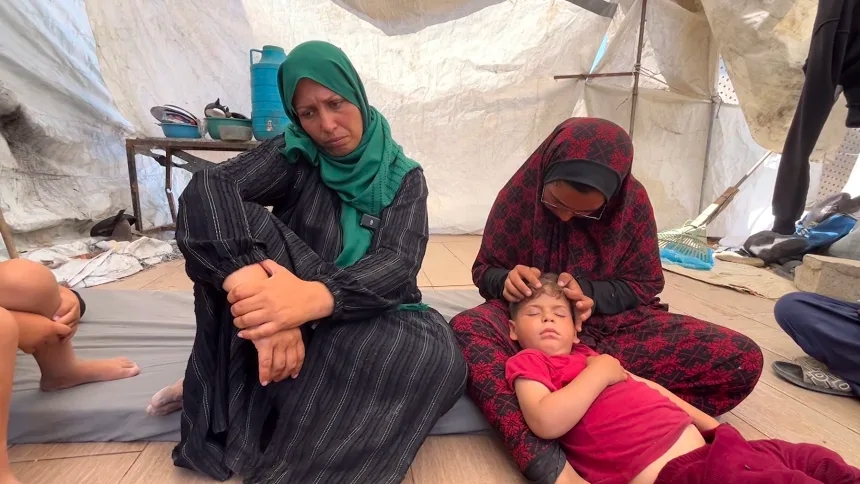 ‘We don't want you to die': Palestinian mom's children fear for her life as she sets out to get food