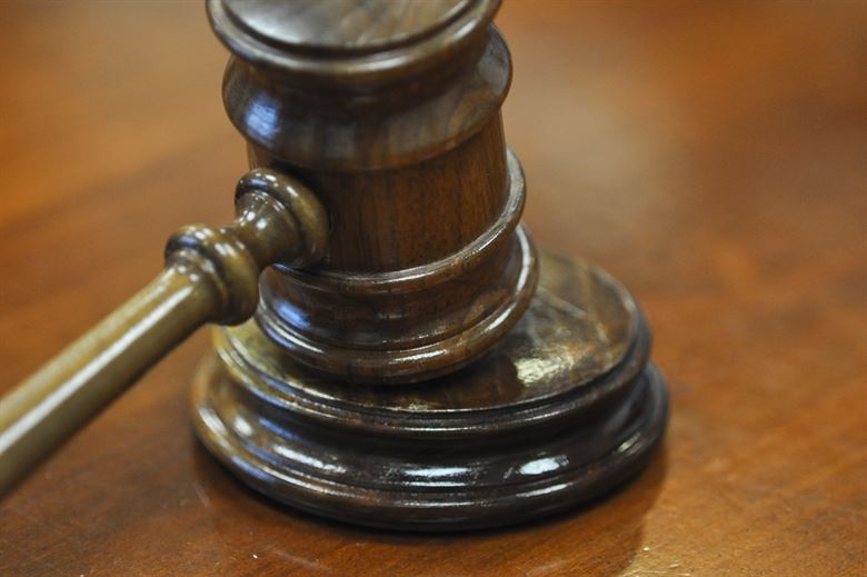 Pic: DOJ worker allegedly spiked pregnant girlfriend's drink with abortion pill
