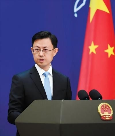China says 'door open' to trade talks after Trump signals tariffs will fall