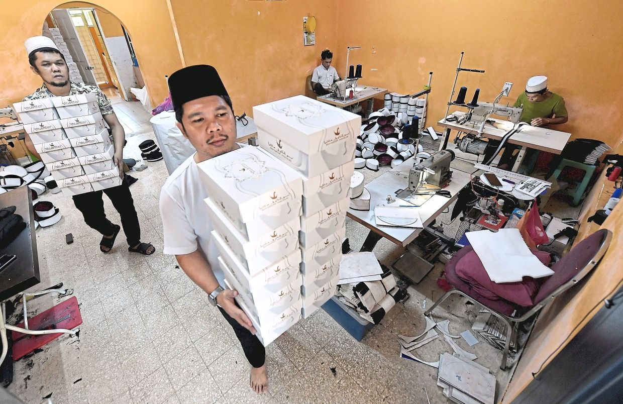 Sabak Bernam company's songkok recycling programme helps with sustainability, preserving heritage