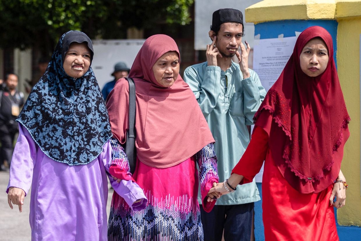 Ayer Kuning polls: Single mum does not deprive autistic children of voting