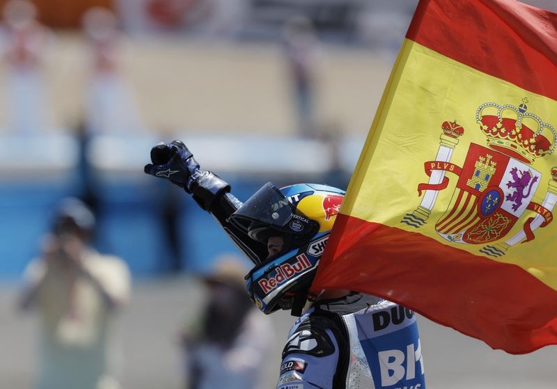 Motorcycling-Alex Marquez claims first MotoGP win in Spain after brother Marc crashes