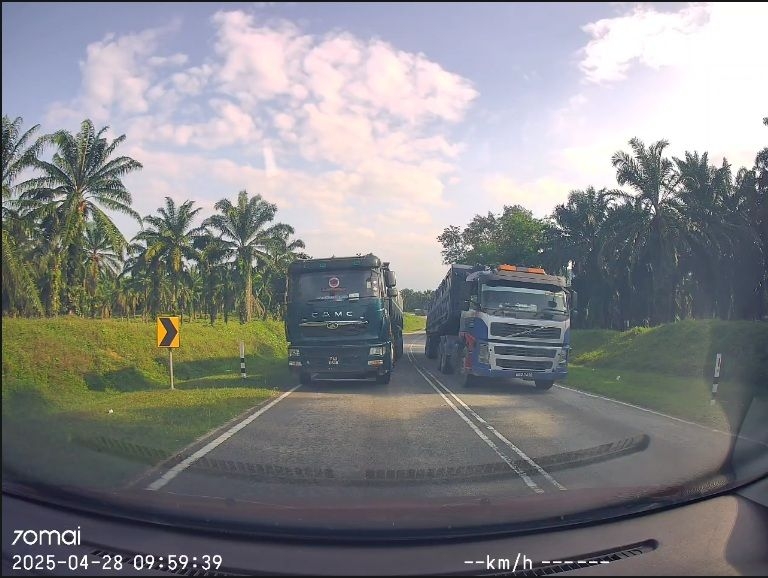 Cops question lorry driver after double line near miss in Nilai