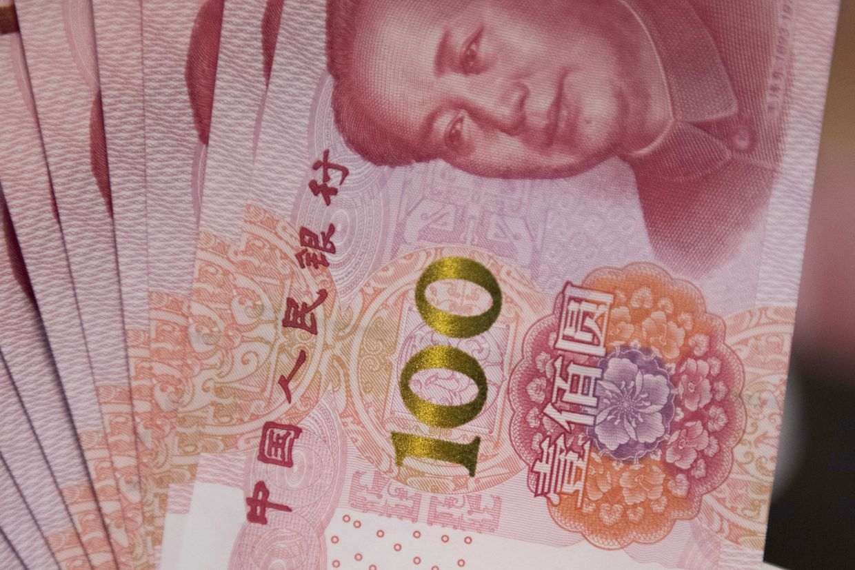 Seminar on renminbi internationalisation held in Laos