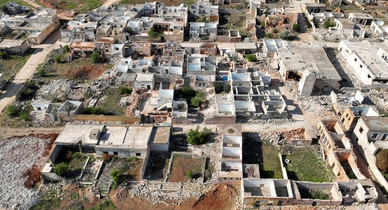 Lacking aid, Syrians do what they can to rebuild devastated Aleppo
