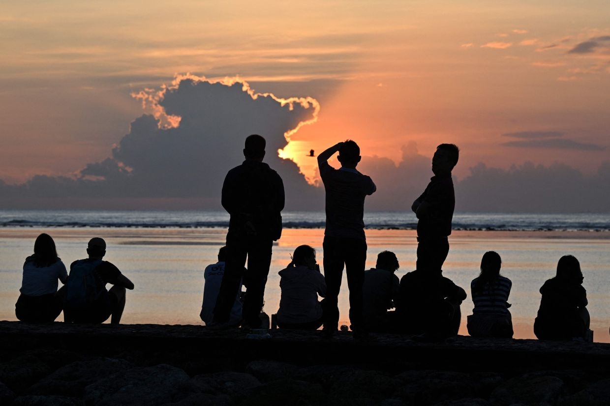 Power begins to return after outage in Bali