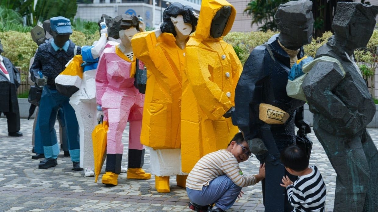 Hong Kong sculpture with yellow raincoats won't return outside Cultural Centre