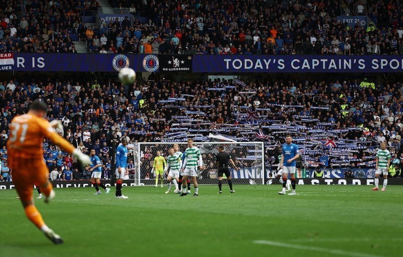 Soccer-Rangers condemn shotgun banner during Old Firm derby
