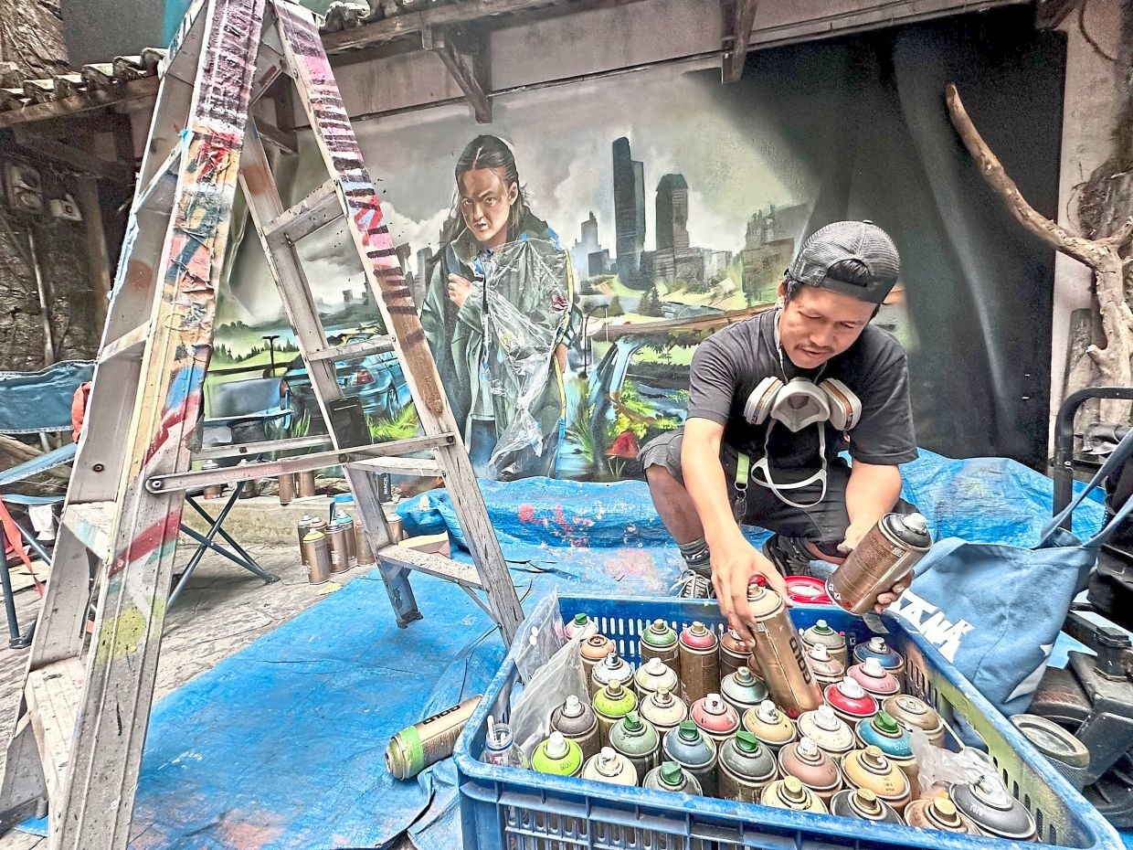 Artist and friends put heart into mural for TV series in KL Chinatown