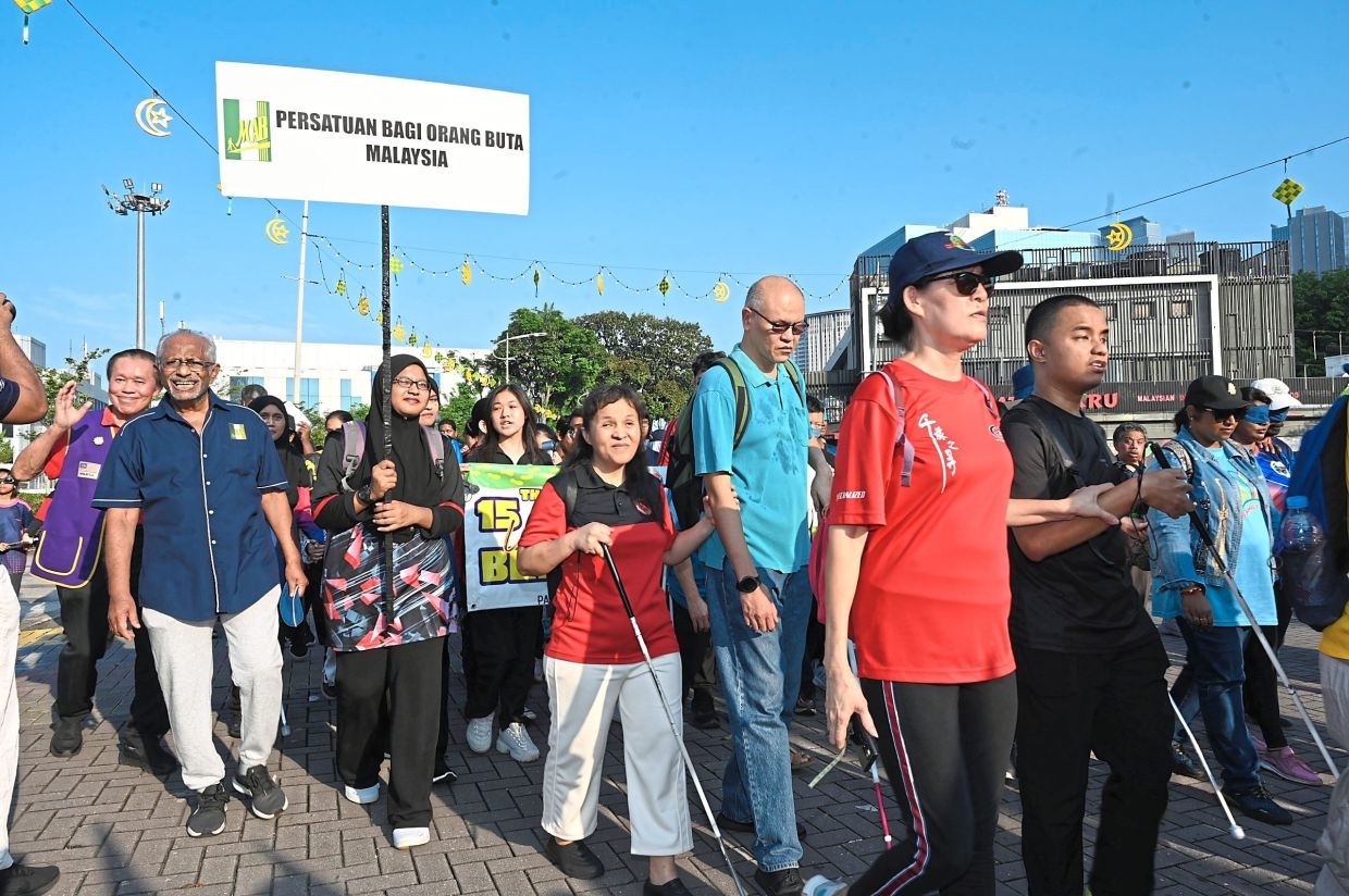 Blind leading the sighted on 3km PJ solidarity walk