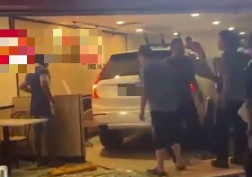 Vehicle ploughs into eatery, kills woman