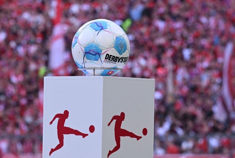 Soccer-Bochum, Kiel relegated, Heidenheim get lifeline with win at Union