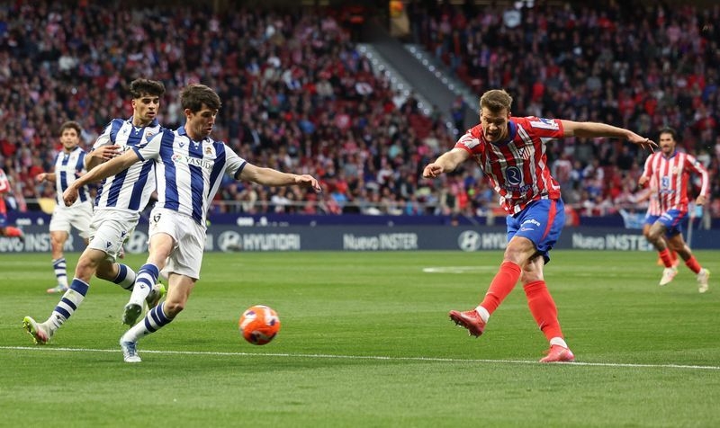Soccer-Atletico's Sorloth grabs all four goals and sets record in Sociedad rout