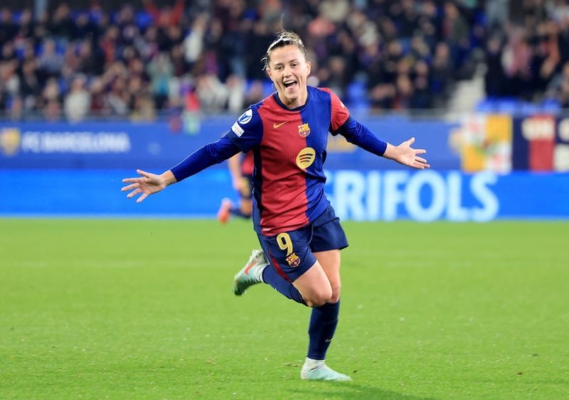 Soccer-Barcelona hammer Betis 9-0 to win sixth straight Liga F title