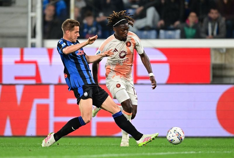 Soccer-Atalanta secure Champions League spot with Roma win