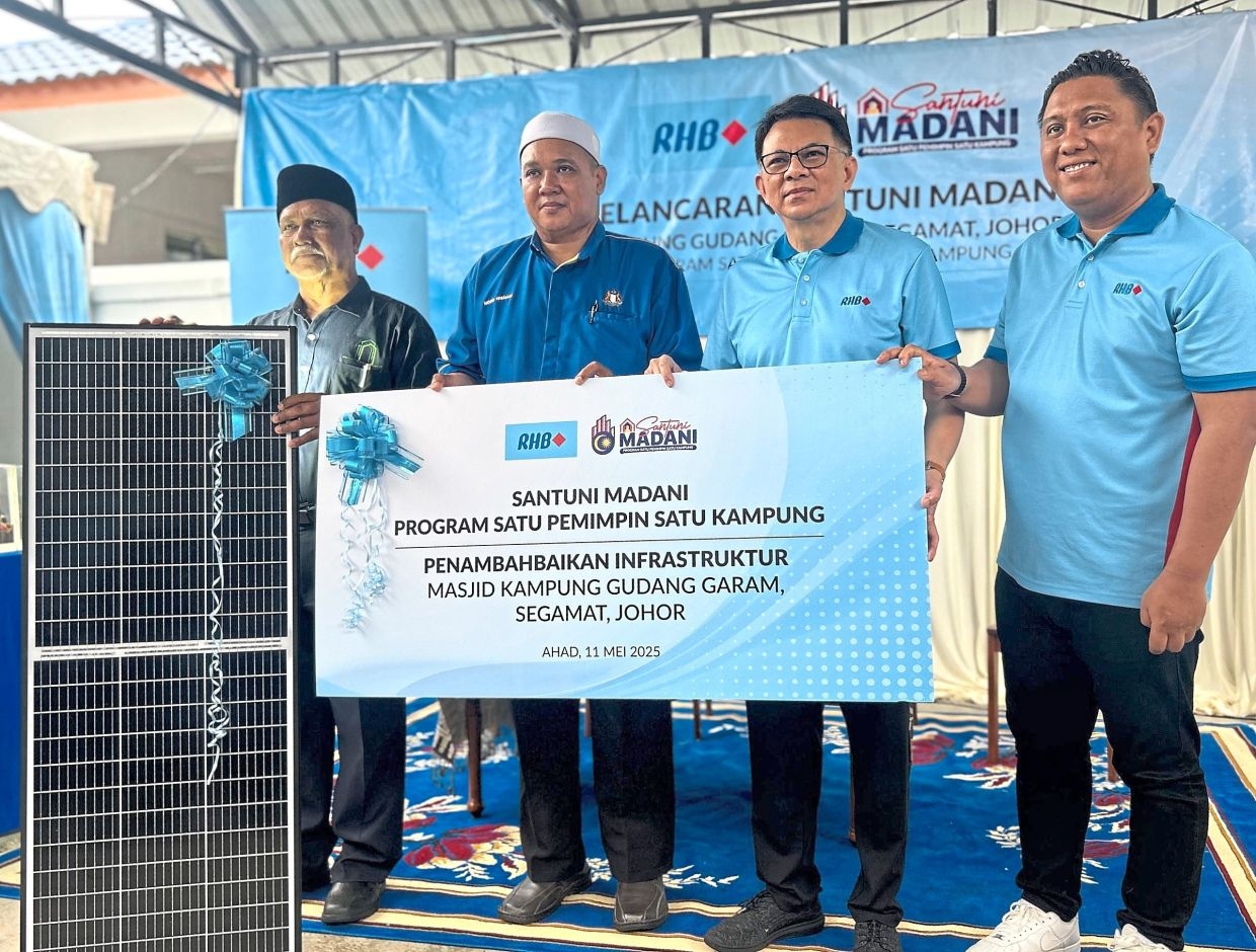 Banking group adopts Segamat village