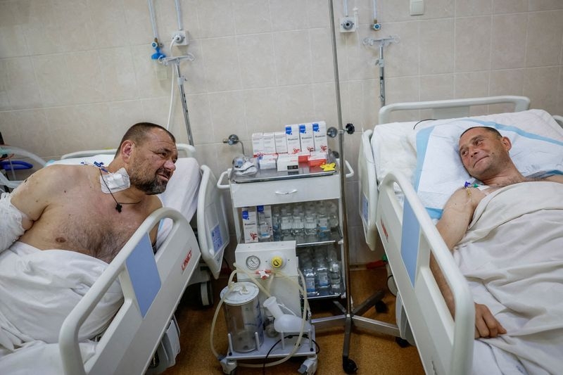 Amid diplomatic flurry, Ukrainian hospital treating war-wounded yearns for peace
