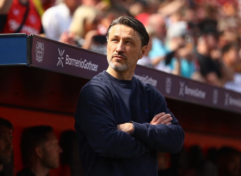 Soccer-Dortmund playing a final against Kiel for Champions League spot, says Kovac