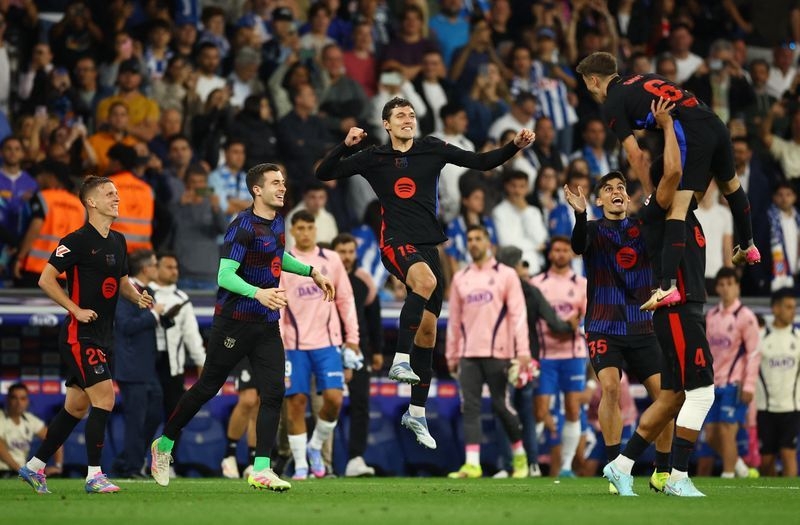 Soccer-Barcelona claim 28th LaLiga title after 2-0 win at Espanyol