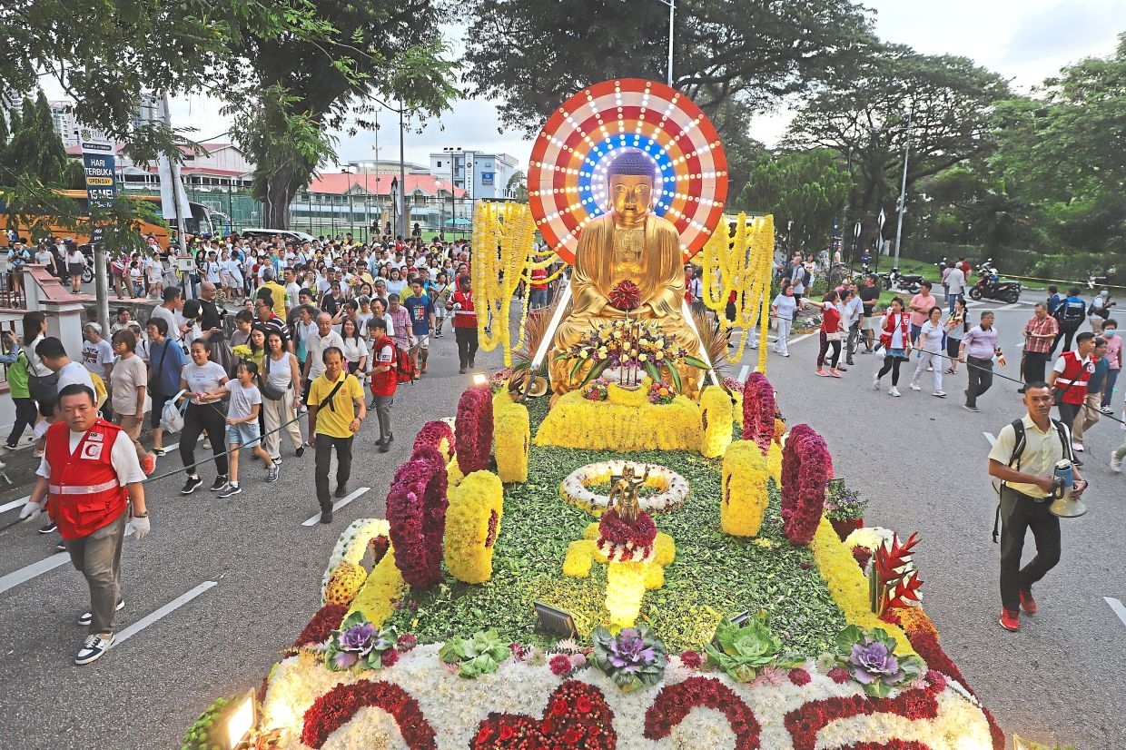 Dazzling floats brighten parade
