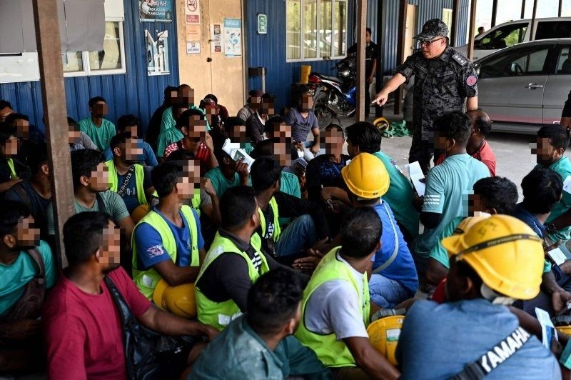 Indonesia arrests 170 foreigners in immigration sweep