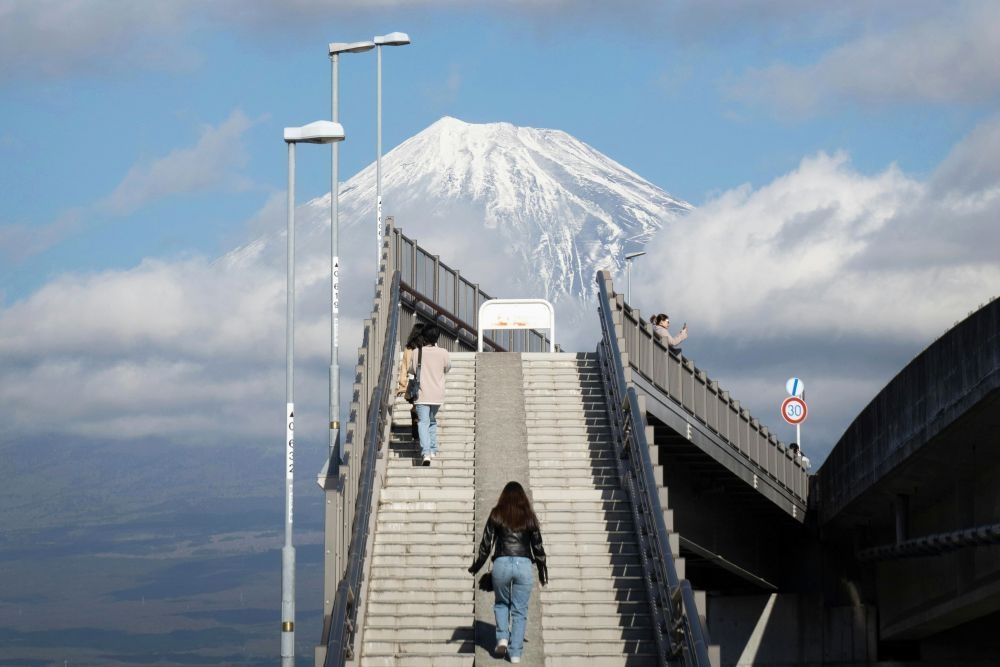Japan's 'perfect Mount Fuji shot' site faces backlash over tourist surge