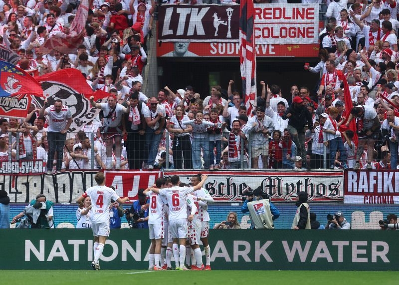 Soccer-Cologne earn Bundesliga promotion with 4-0 win over Kaiserlautern