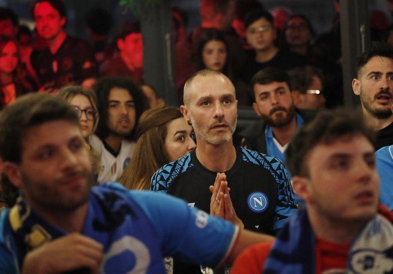 Soccer-Napoli fans calm as city holds breath for Scudetto showdown