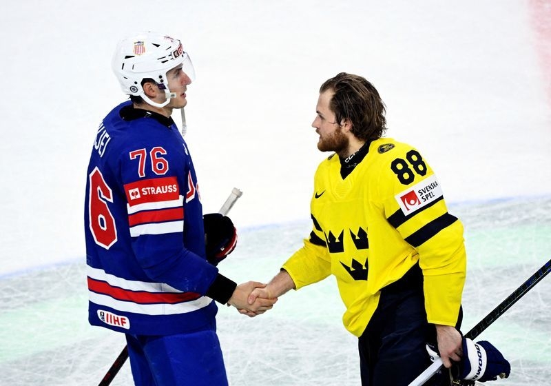 Ice hockey-McCarron stakes claim for world championship gold as US down Sweden