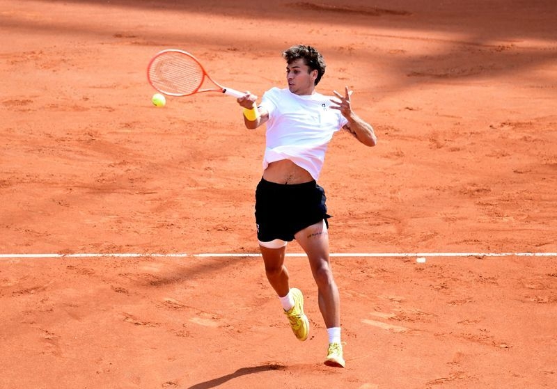 Tennis-Cobolli upsets Rublev to win Hamburg Open