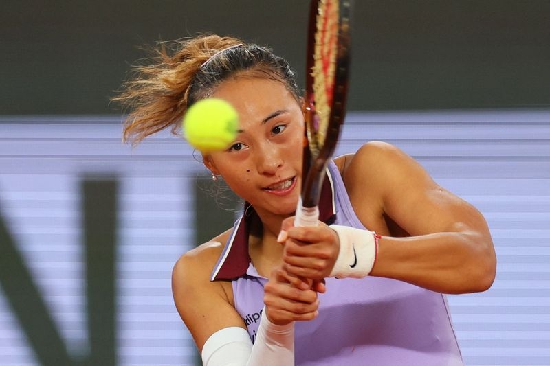 Tennis-Zheng stretches winning run in Paris with victory over Pavlyuchenkova