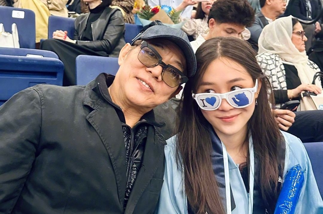 Action star Jet Li attends youngest daughter's graduation ceremony in the US