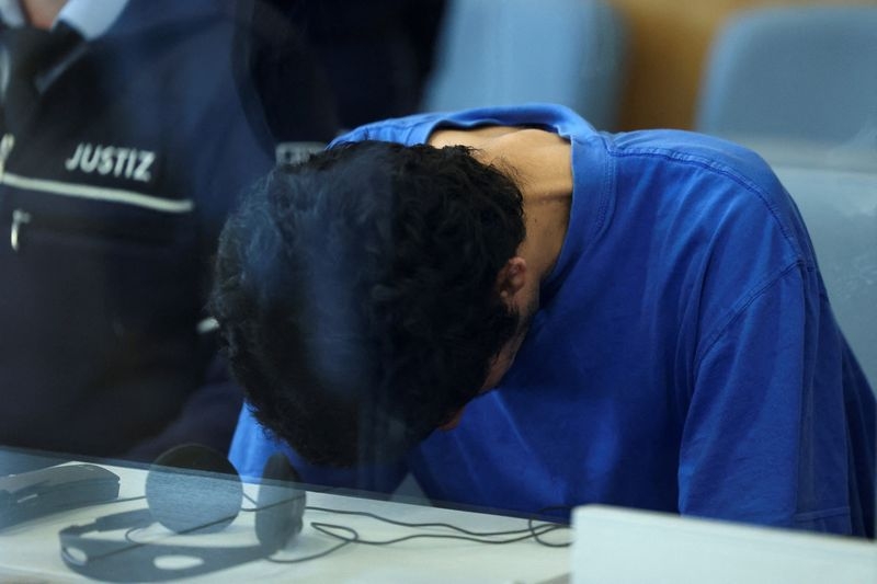 Germany tries Syrian man over deadly stabbing that stoked migration debate