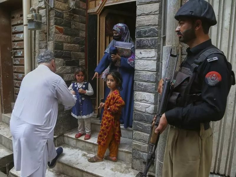 Gunmen kill police officer assigned to protect polio workers in southwestern Pakistan