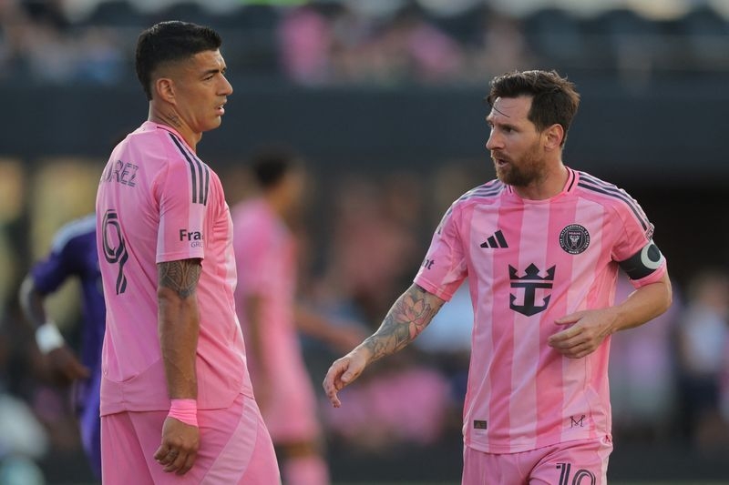 Soccer-Old Friends, New Goals: Messi joins Suarez in Uruguayan club venture