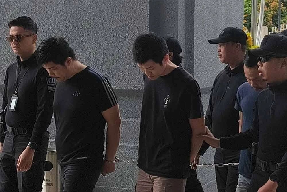 Trio gets one-year jail for splashing paint at Brickfields house