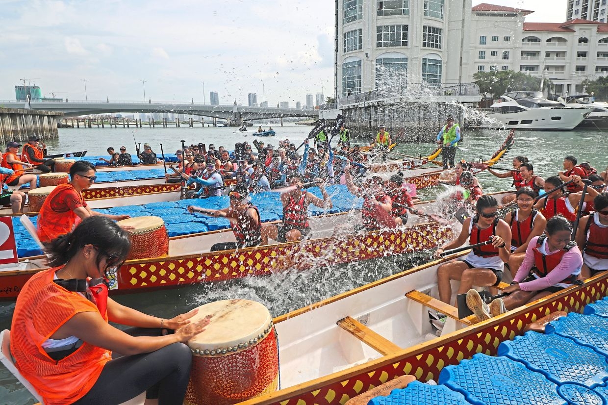 Dragon-riding Penangites to row it out