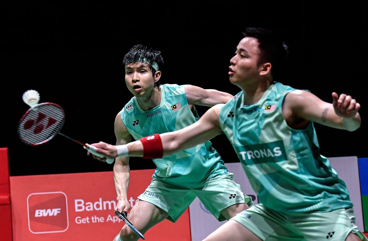 Aaron-Wooi Yik break jinx to reach Singapore Open quarter-finals