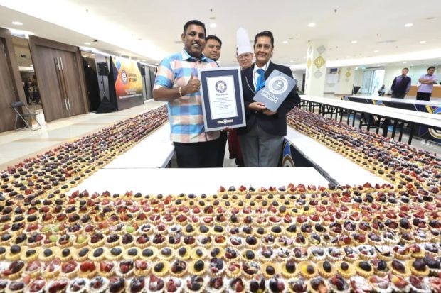 Chefs set new world record for longest line of tarts in Johor