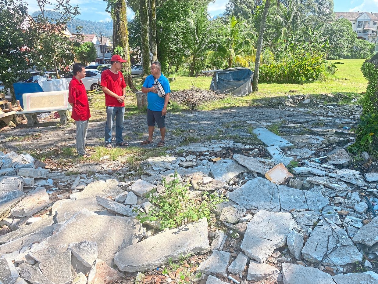 Selayang folk upset over rubble of illegal car wash on field