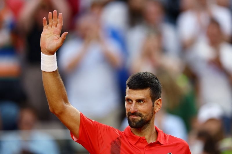 Tennis-Djokovic gets on his bike for adrenaline rush around Paris