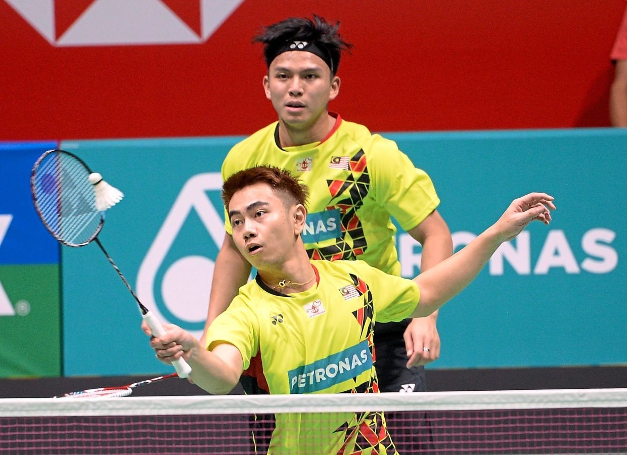 Badminton: World No. 1 pair Sze Fei-Izzuddin bow out in quarter-finals of Singapore Open