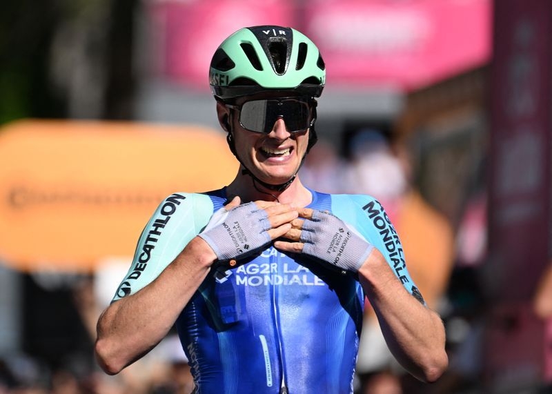 Cycling-Prodhomme solos to Giro stage 19 win in mountains, Del Toro extends overall lead
