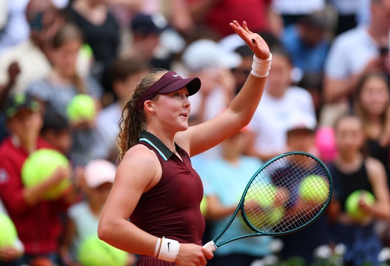 Tennis-Andreeva's lucky charm helps her into French Open last 16