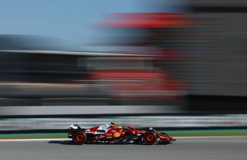 Motor racing-Front wing changes a waste of money, says Hamilton