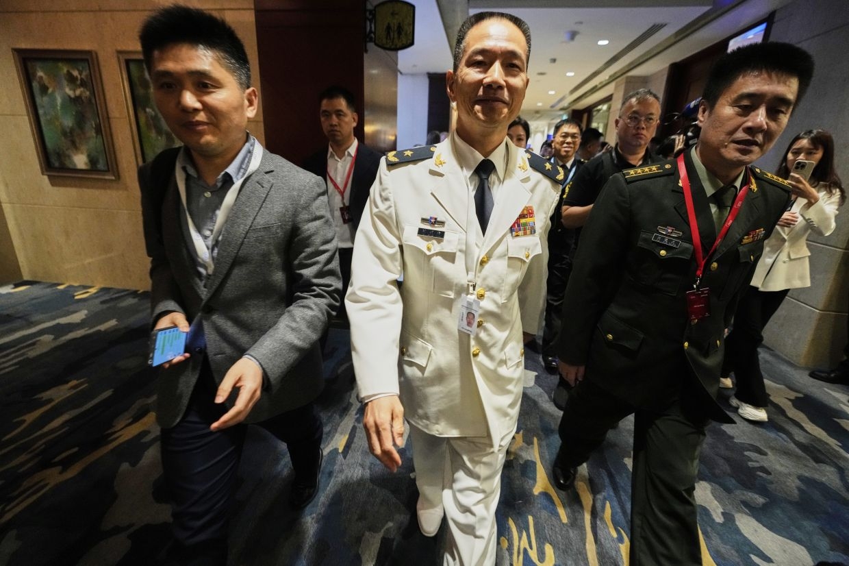 Did China take a back seat by not having its defence minister attend this year's Shangri-La Dialogue?