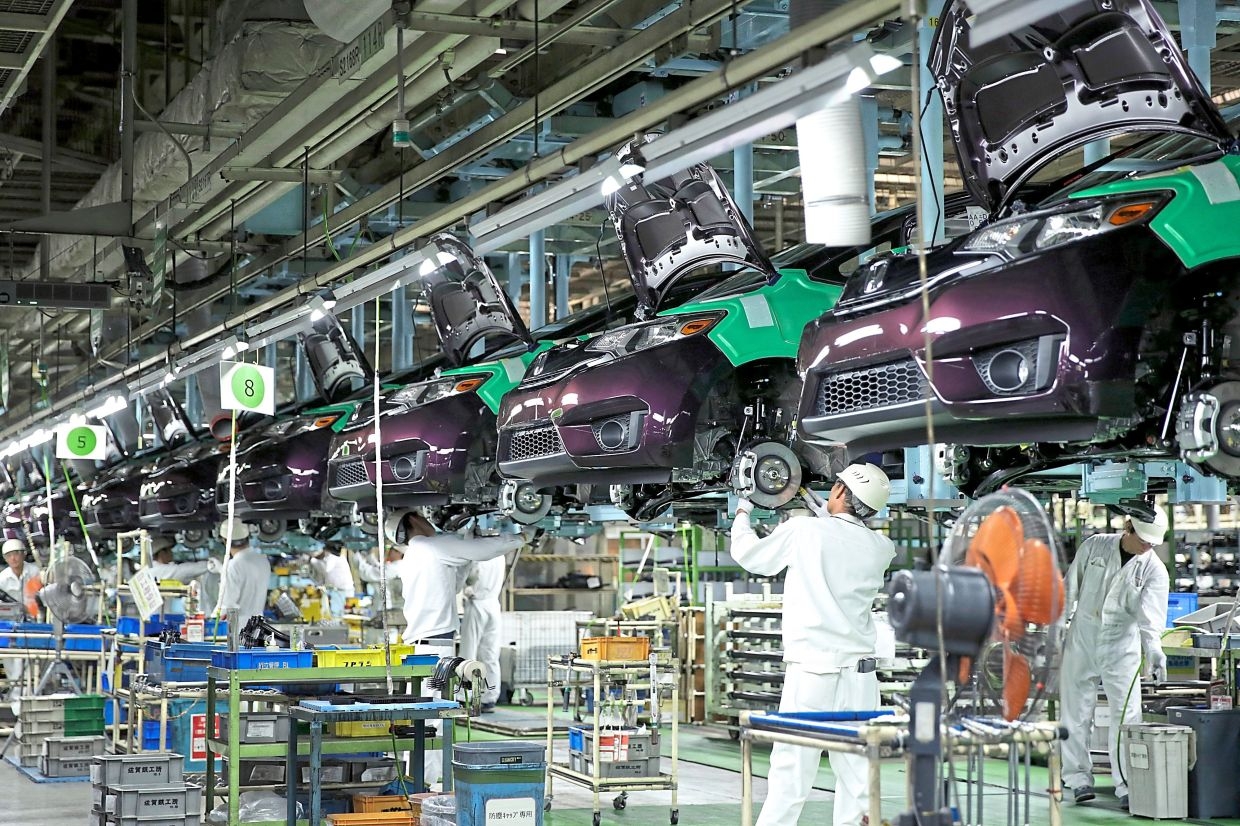Japan factory declines slow in May but tariff worries persist, PMI shows