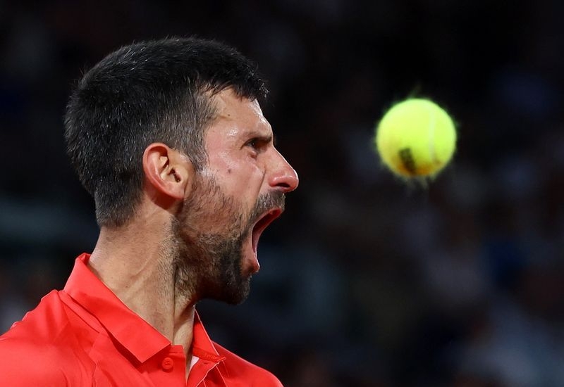 Tennis-Djokovic seeks landmark 100th win at French Open